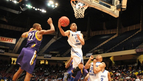 Fred Knight goes up for a layup during the Devils' semi-final loss Thursday.
