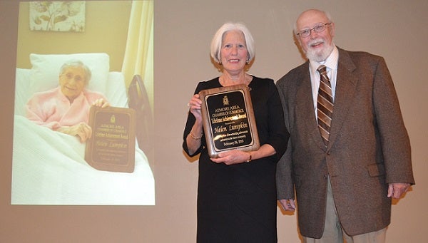 Helen Lumpkin, a 102-year-old resident at the Atmore Nursing Center, was named the 2014 Lifetime Achievement Award winner at Thursday's annual chamber banquet. Shown with the award are Lumpkin's niece Linda Lumpkin Ellison and nephew Jim Lumpkin.
