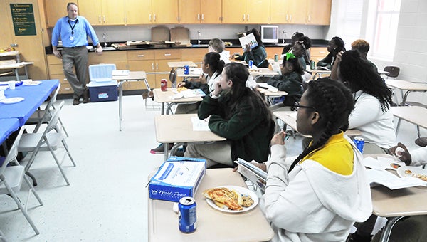 Seventh and eighth graders at Escambia County Middle School listen to teacher Conrad Weber. | Andrew Garner/Atmore Advance