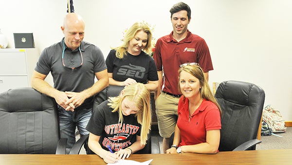 Northview senior Moriah McGahan signed a letter of intent to run cross country at Southeastern University last Friday. McGahan has been running cross country since her days at Ernest Ward Middle School. She ran two years at EW and all four years at NHS. Her cross country coach, Natalie Nall, said she was grateful to have McGahan show so much interest in running. McGahan is the daughter of Greg and Candy McGahan of Molino, Fla. | Andrew Garner/Atmore Advance