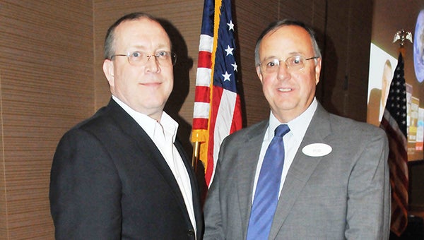 United Bank President and CEO Bob Jones (right) stands with Dr. Thomas Barnett after the bank’s advisory board meeting. | Andrew Garner/Atmore Advance